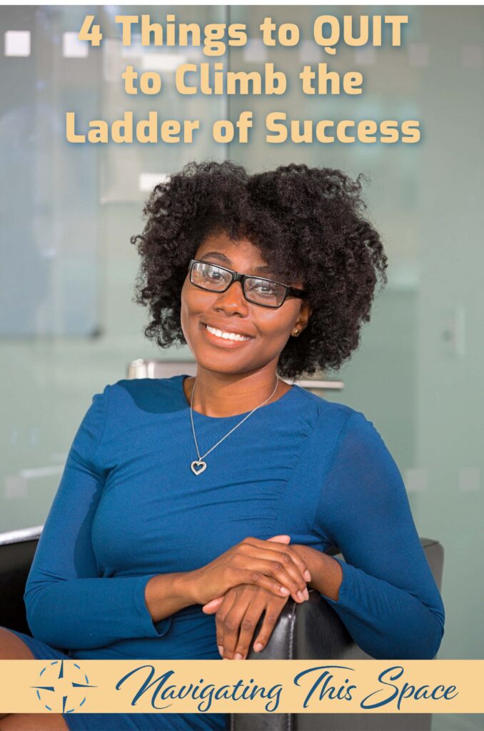 Woman poses while feeling accomplished after climbing the stairs of success