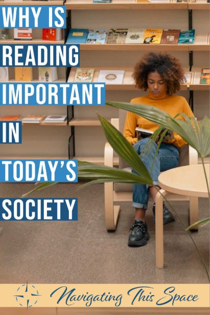 Woman sits in a library reading book - Importance of Reading Books