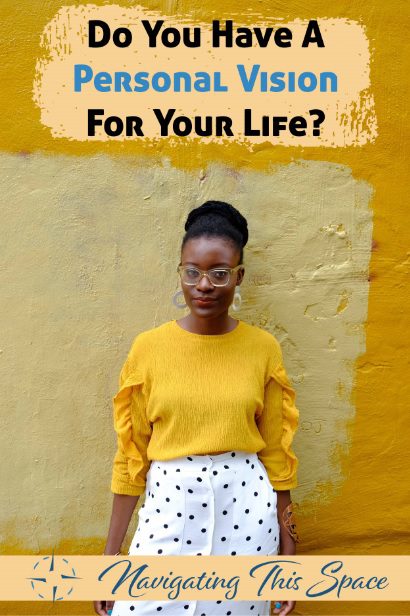 Woman wearing yellow shirt poses for the camera while visioning her life