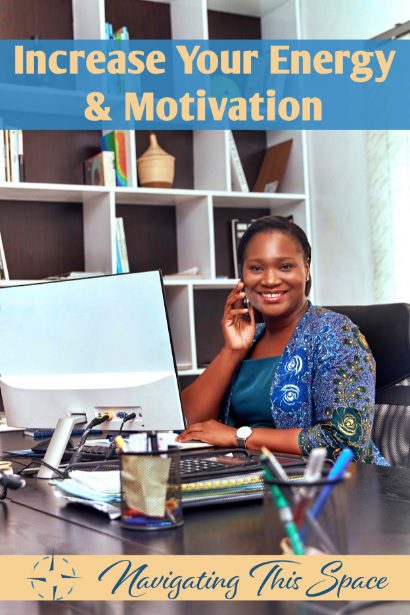 Black woman sits in her office in front of a screen motivated and increased energy