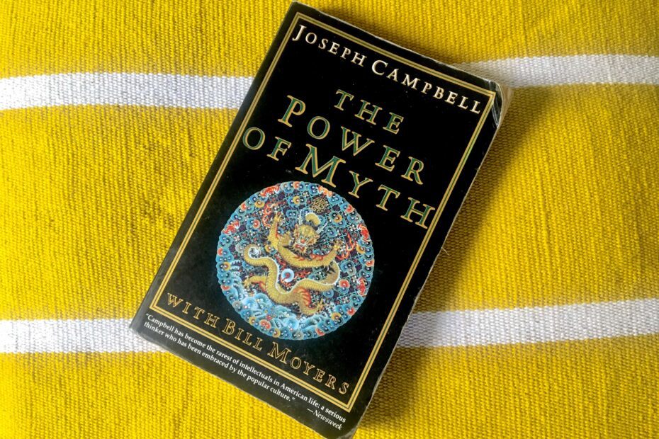 The Power of Myth book by Joseph Campbell with Bill Moyers on a yellow and white textured background.