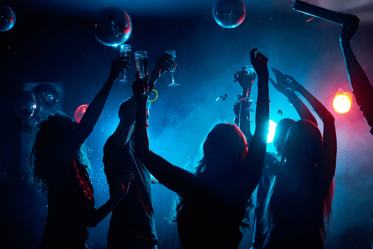 People partying in a dark room