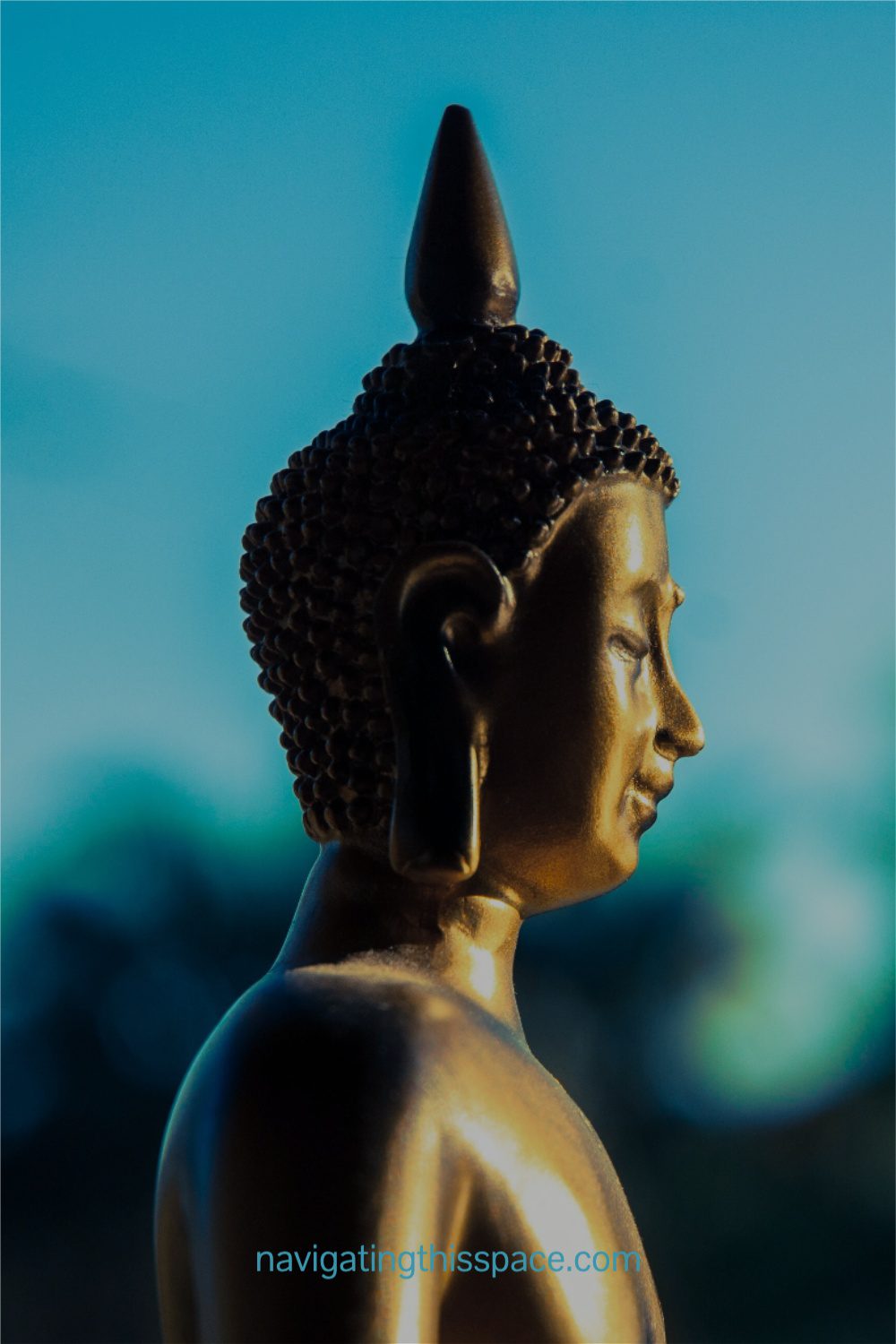 a golden buddha in meditation