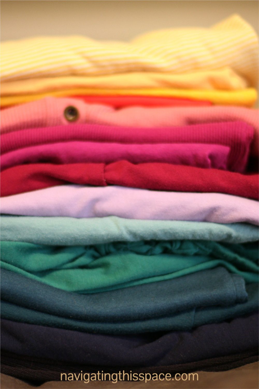 folded neutral colored clothing