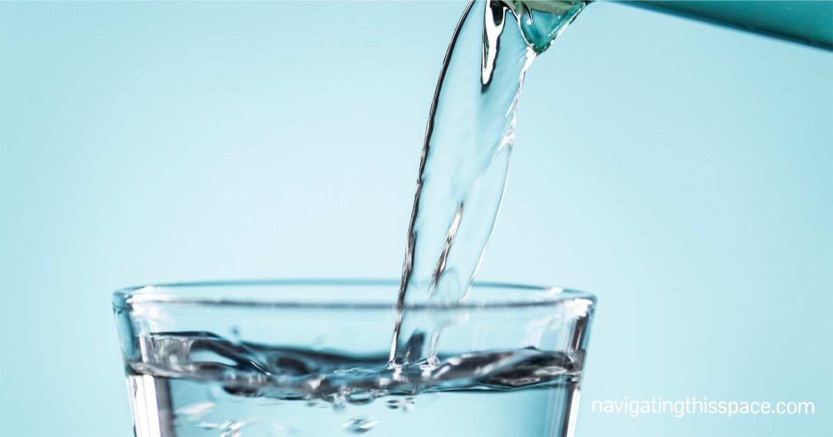 water pouring into a glass