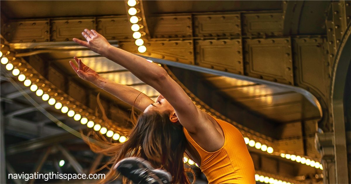 a dancer flying gracefully through the air