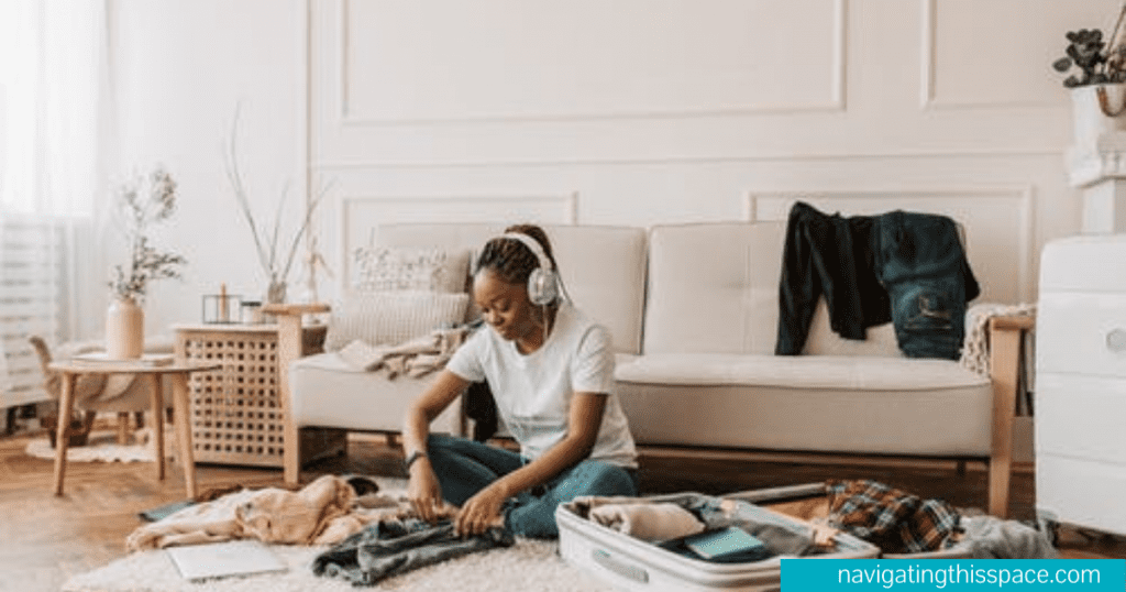 A lady packing her bag for travelling