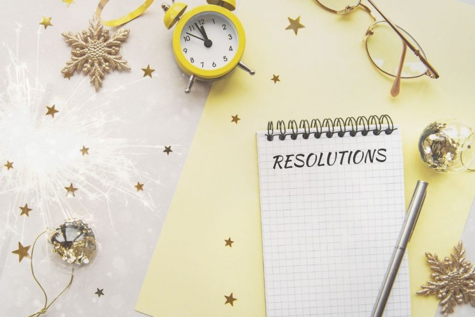 A notebook and pen ready to plan and execute New Year Resolutions